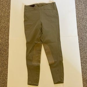 Tan Ariat side zip breeches with belt loops and knee patches